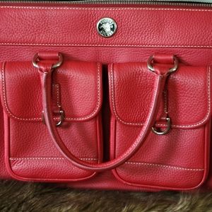This medium Dooney & Bourke red Florentine handbag.